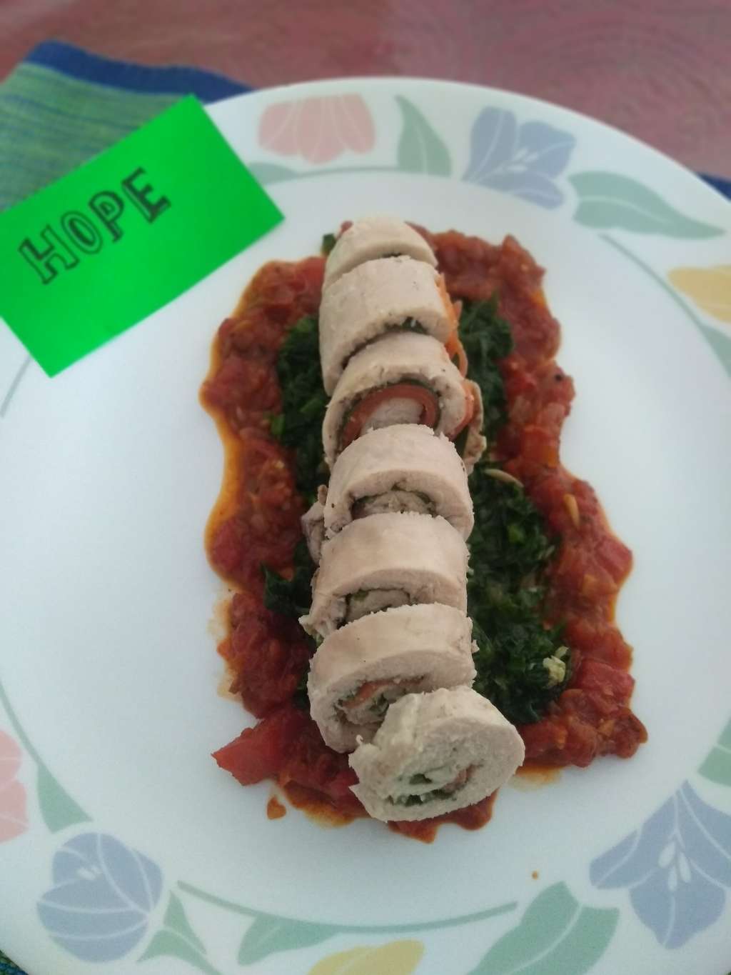 Chicken roulade in tomato and spinach sauce