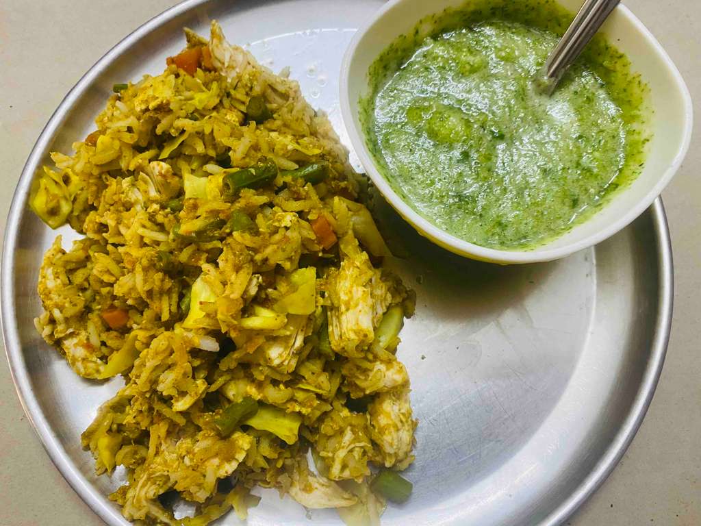 Chicken Biriyani with cucumber Chutney 