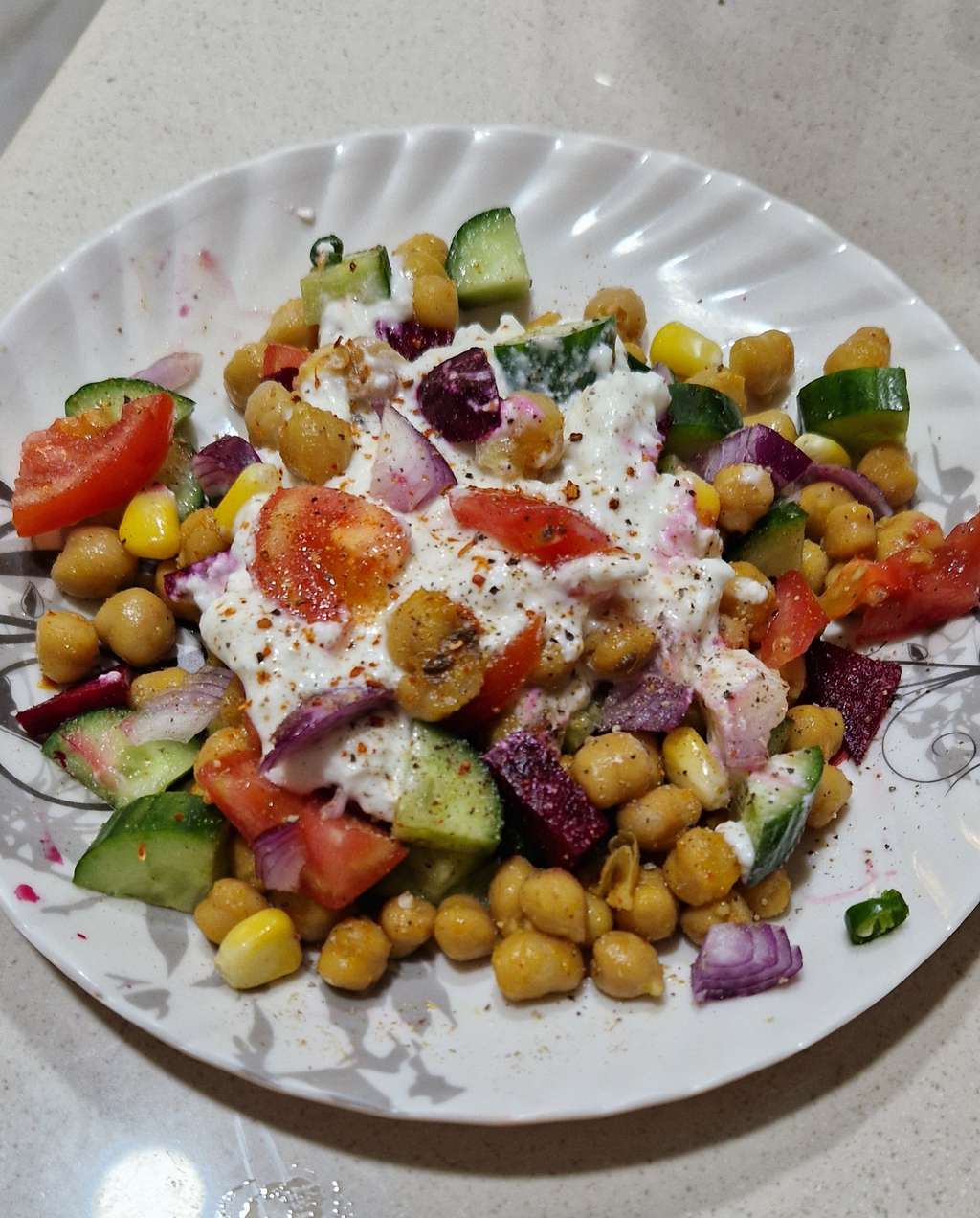 Chana salad with veggies and curd dressing