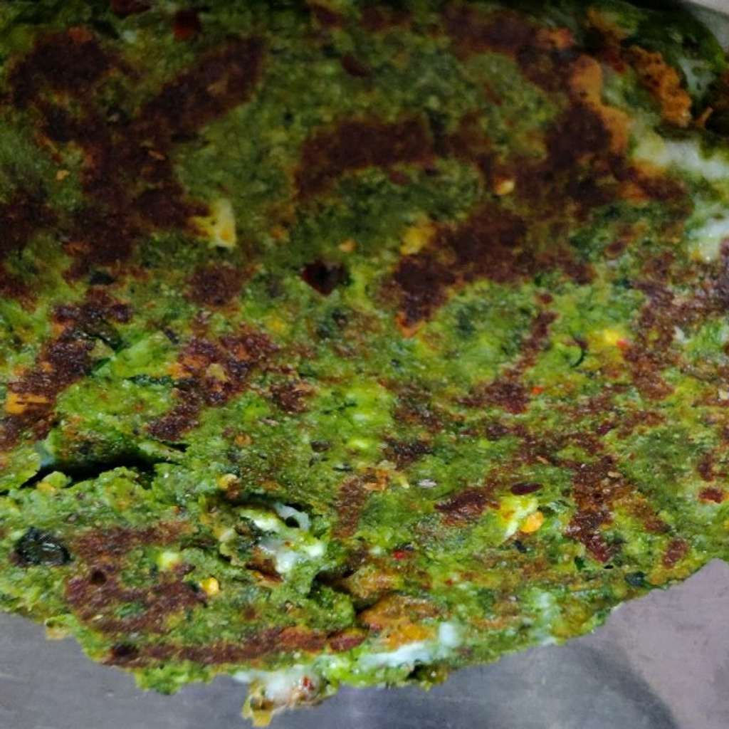Palak Paneer Paratha stuffed with cheese