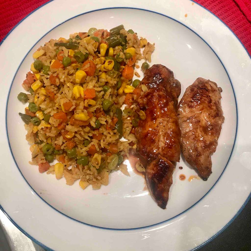 Chicken steak with corn and veggies fried rice
