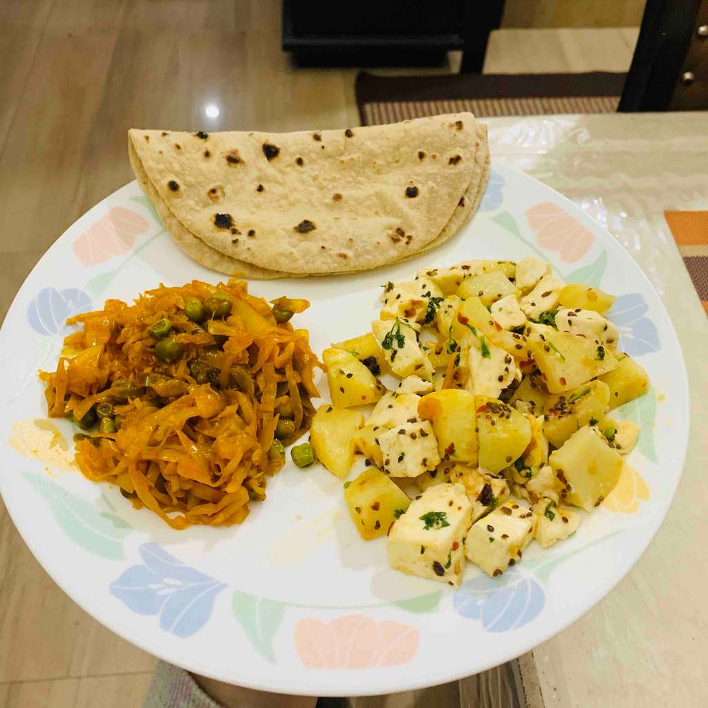 Aloo paneer,cabbage peas and chapati 