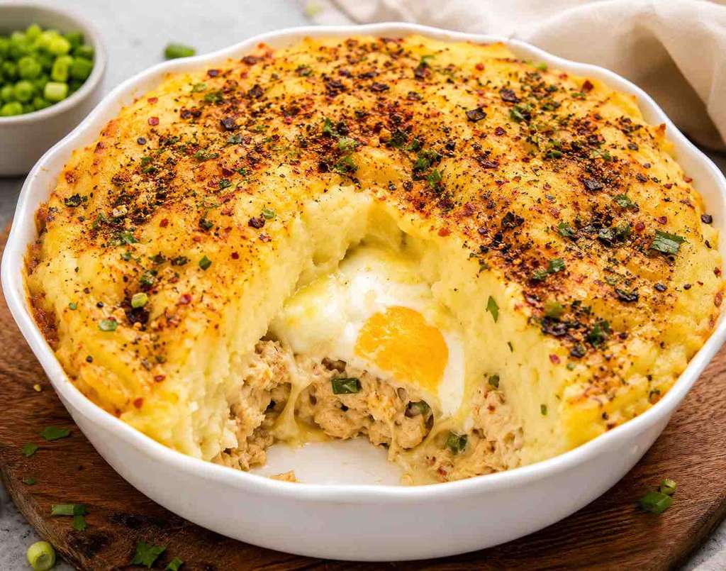 Chicken potato pie with cheese and egg. 