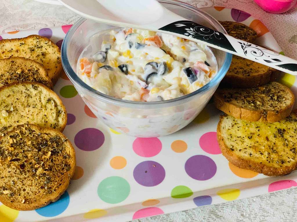 Russian Salad with crisp brown garlic bread