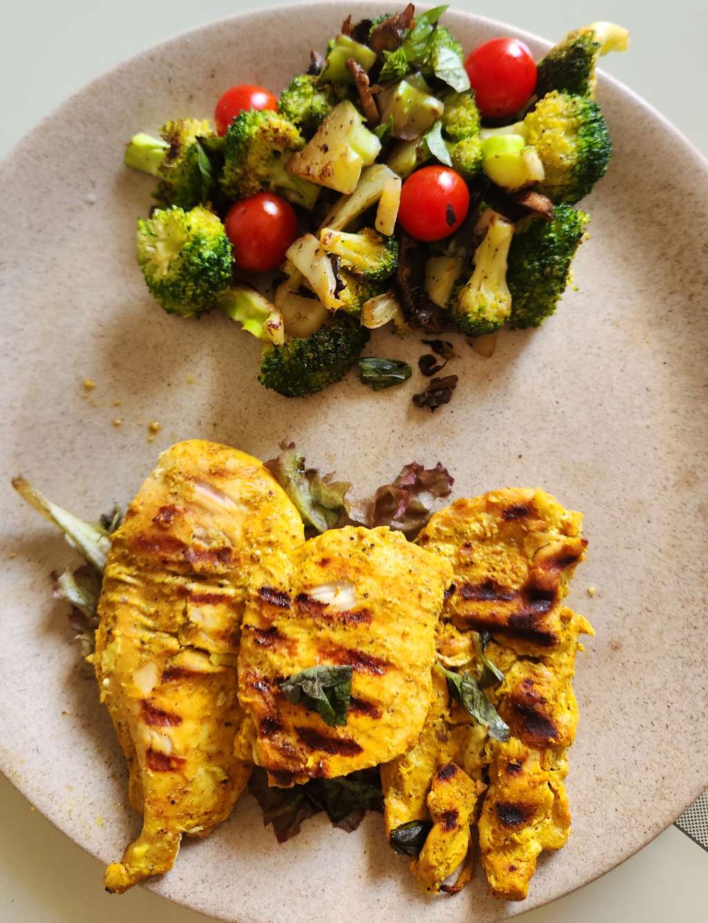 grilled chicken breast amd veggies on the side 