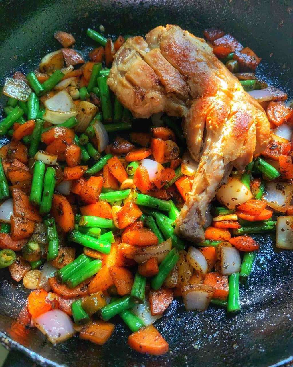 Pan fried chicken with veggies. 