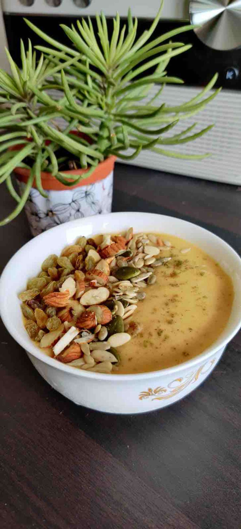 Fruit and nut protein smoothie bowl 