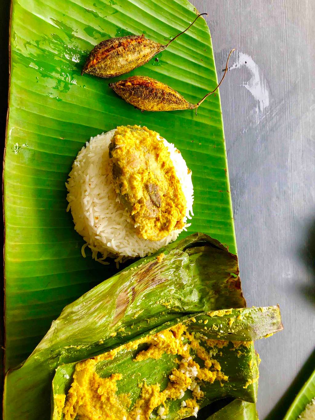 fish paturi ( fish cooked in banana leaves)