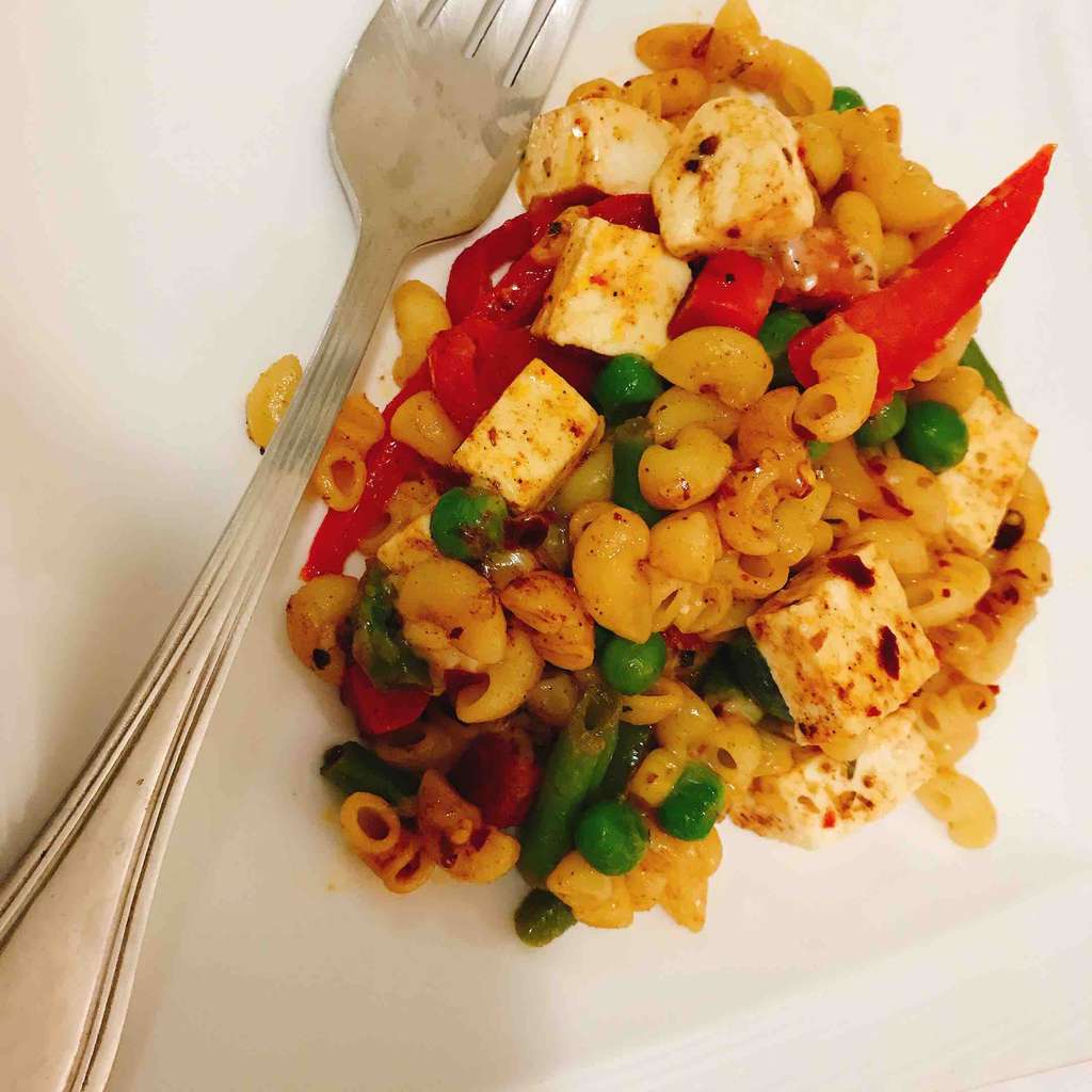 Stir fried cheesy veggie paneer pasta 
