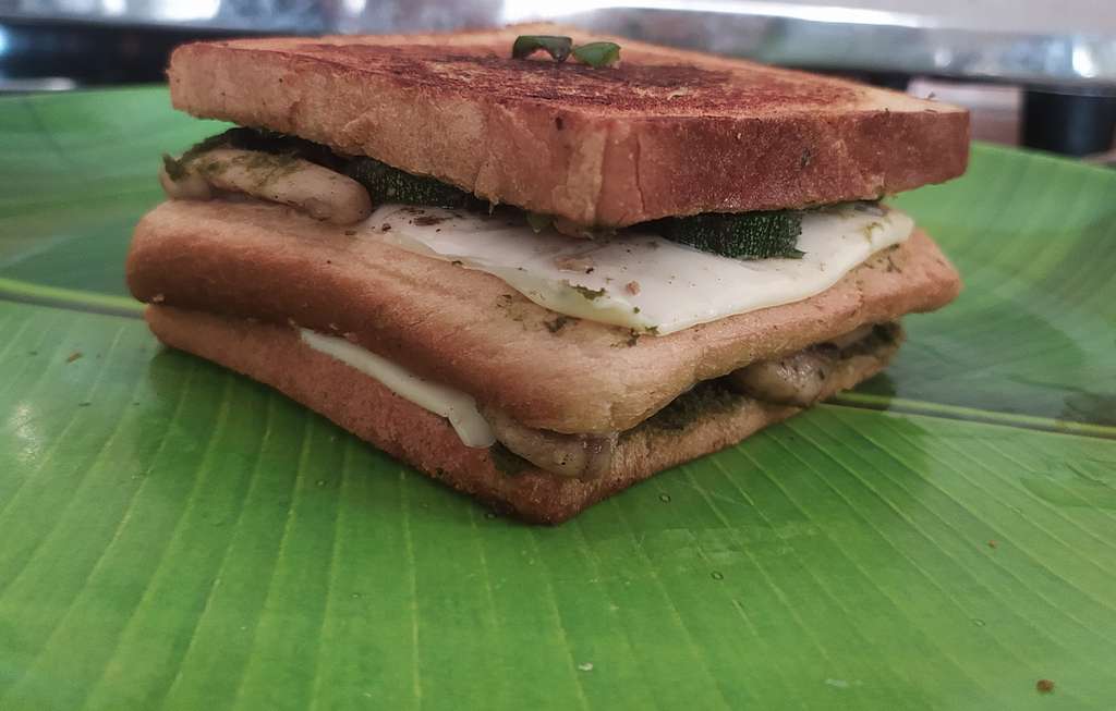 Double-decker green cheese grilled sandwich