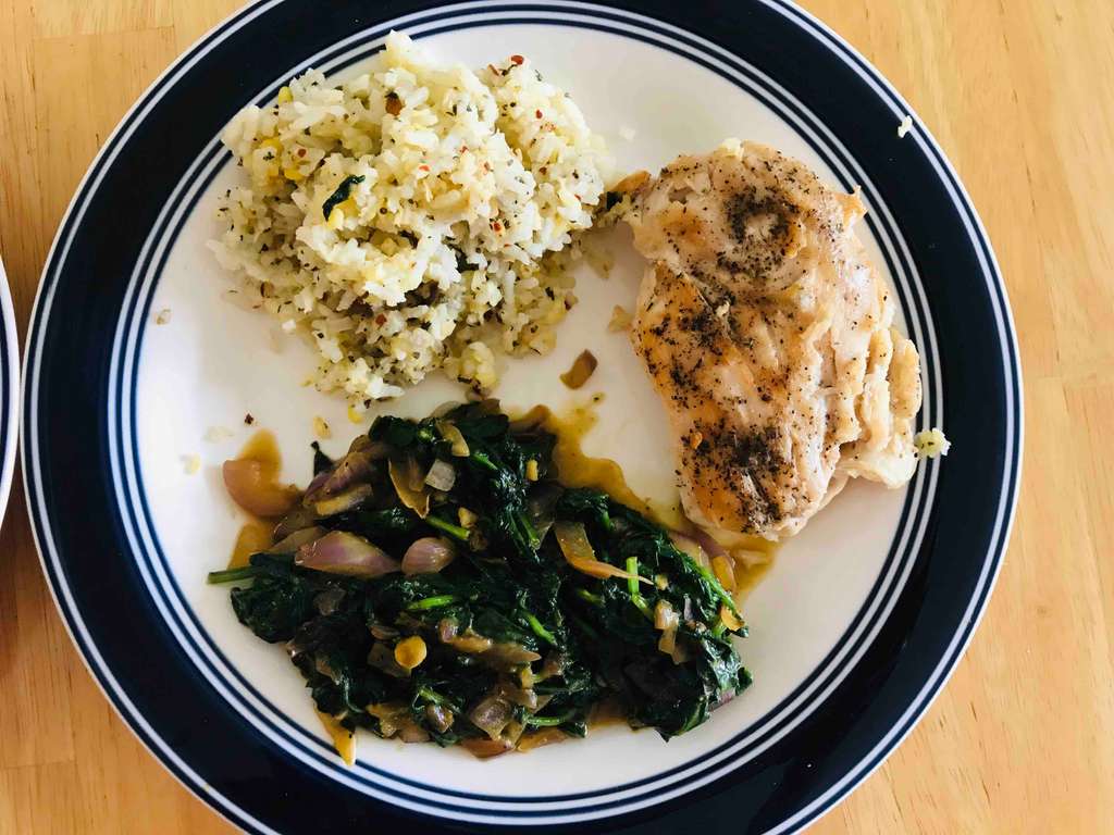 Grilled chicken with spinach and Basil Herb Rice .