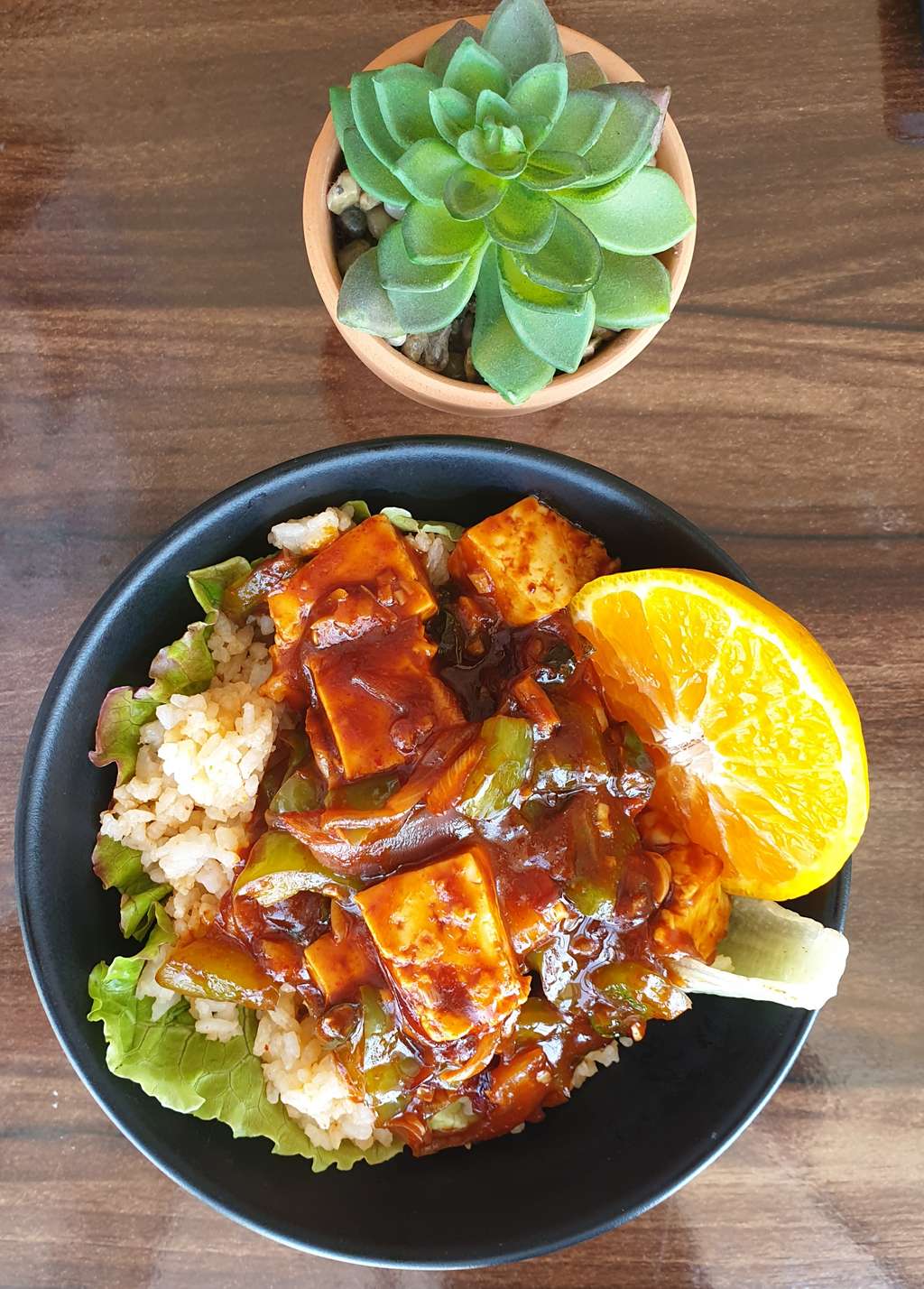 chilly paneer with orange gravy.