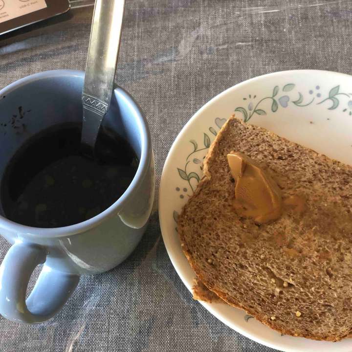 Snack Black coffee , Ezekeil bread & Almond butter