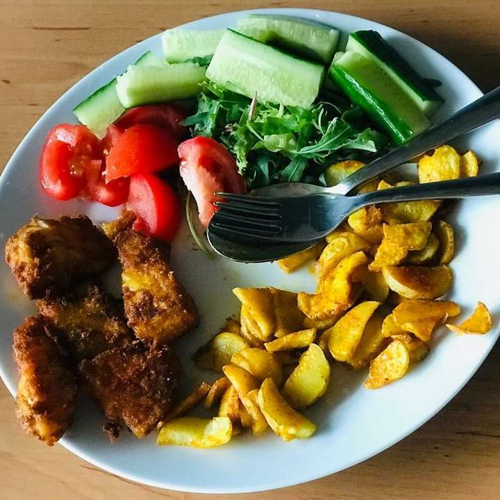 Oven baked fish and potato wedges