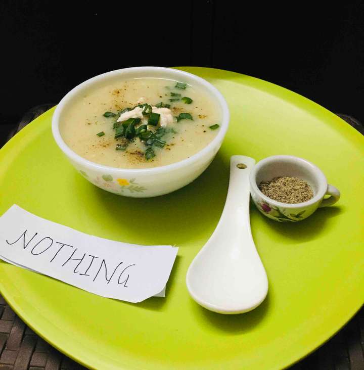Creamy cauli garlic  soup with shredded chicken 