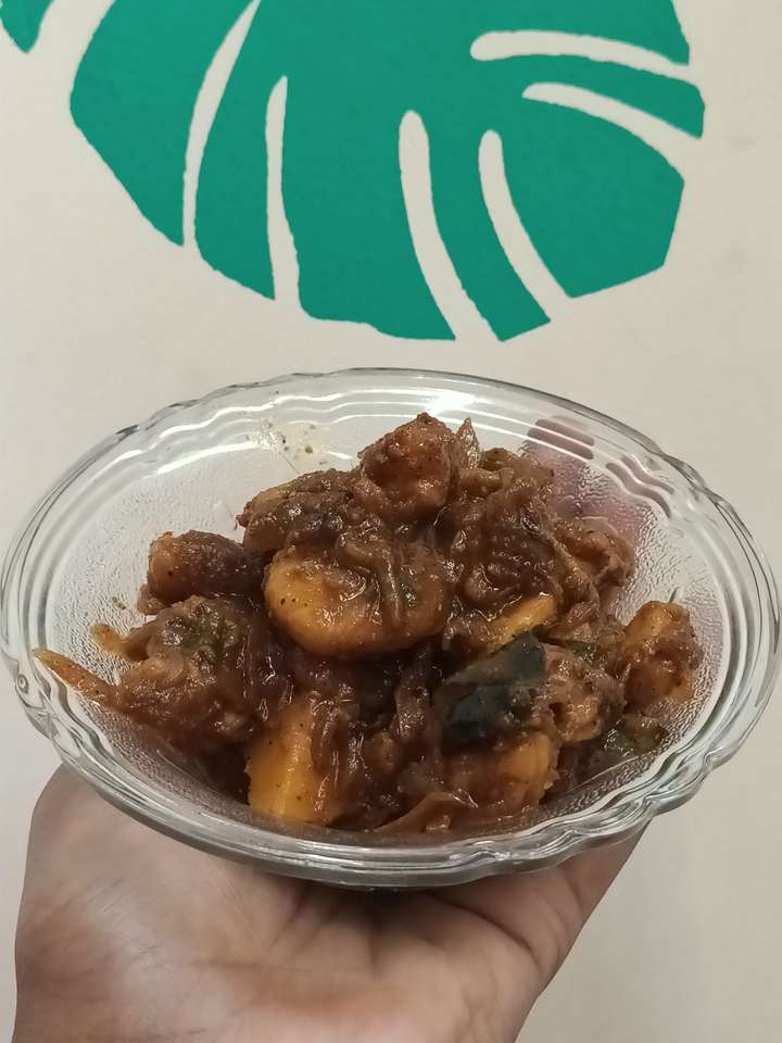 Prawn roast with shallots in coconut oil