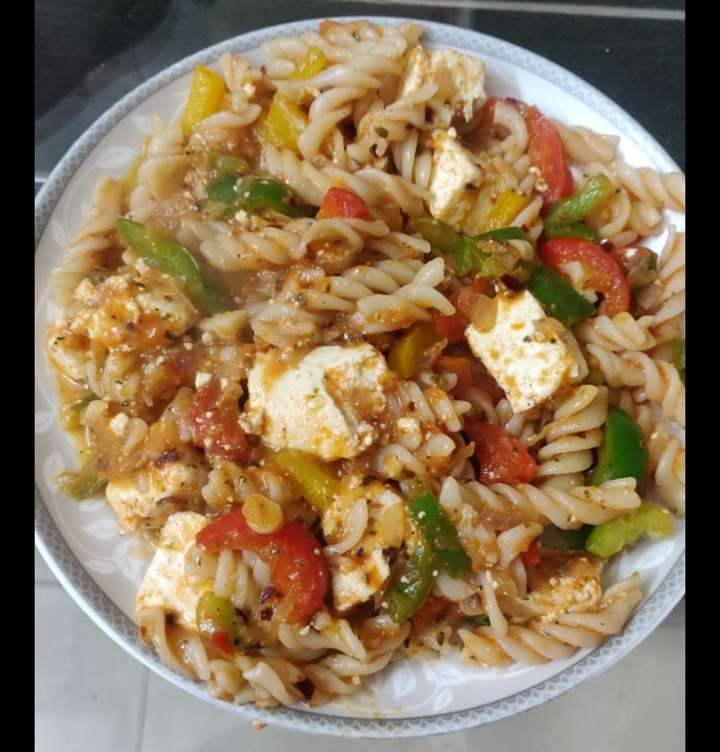 Red pasta with paneer