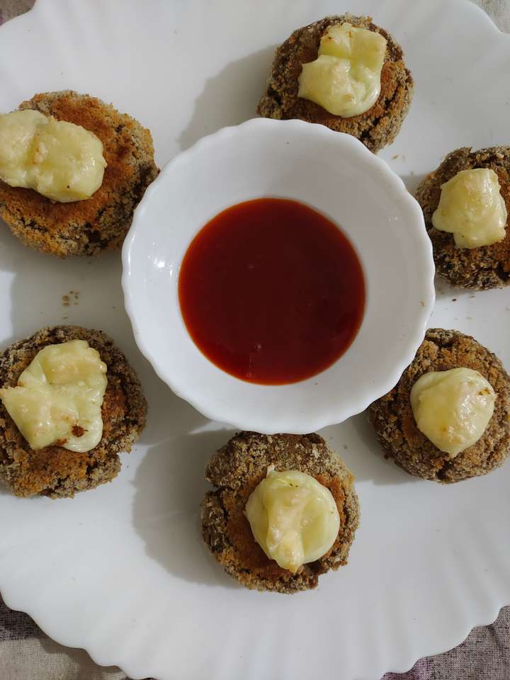 Soya Tikki with melted cheese on top