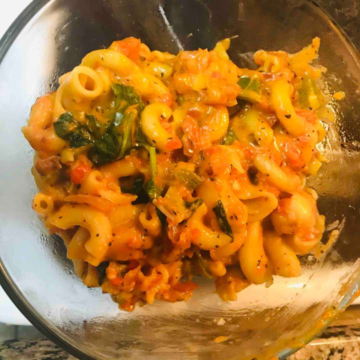 Spinach Pasta with Mozzarella cheese.