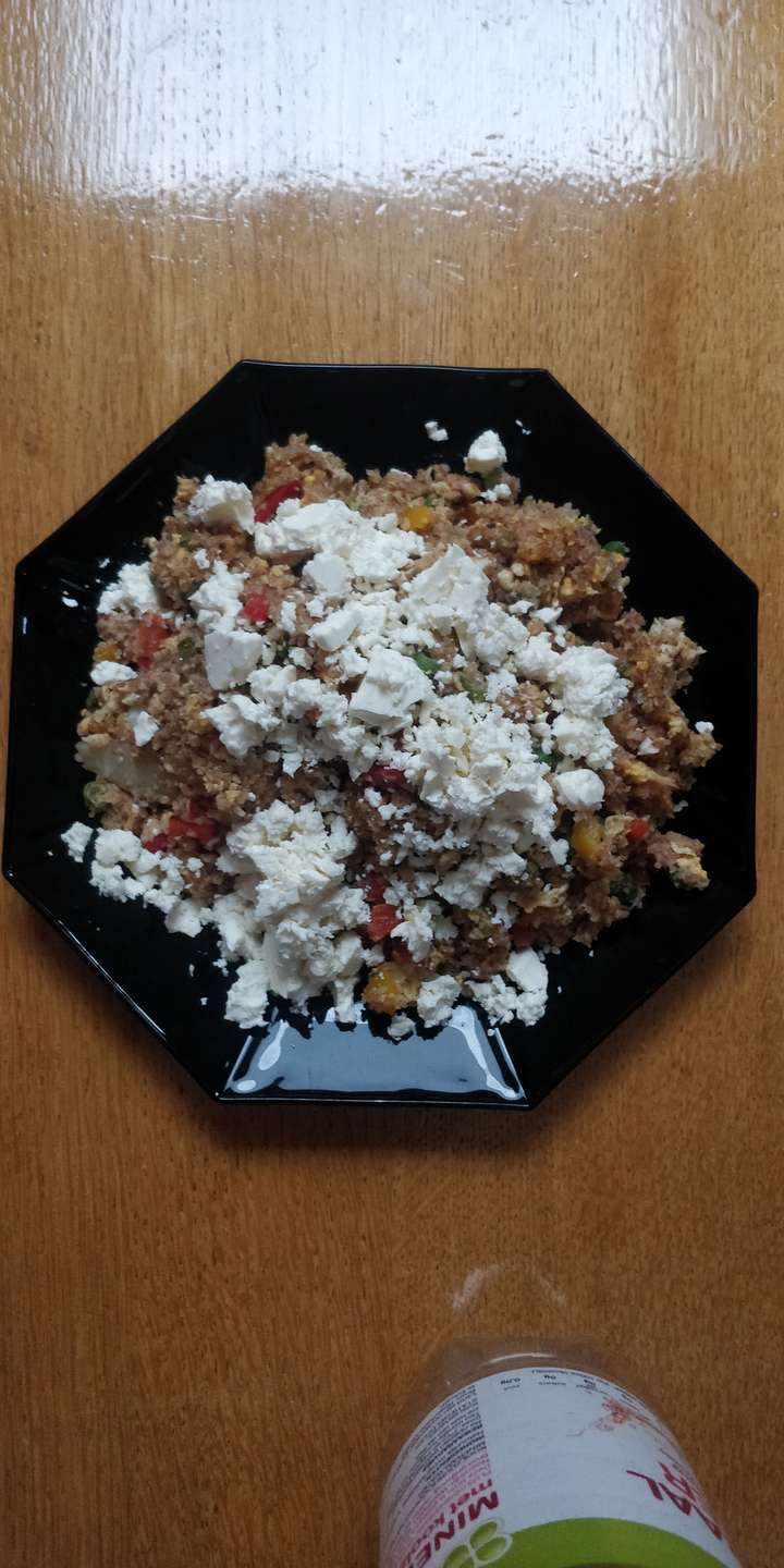 Bulgur with butter sauteed vegetables and salad cheese