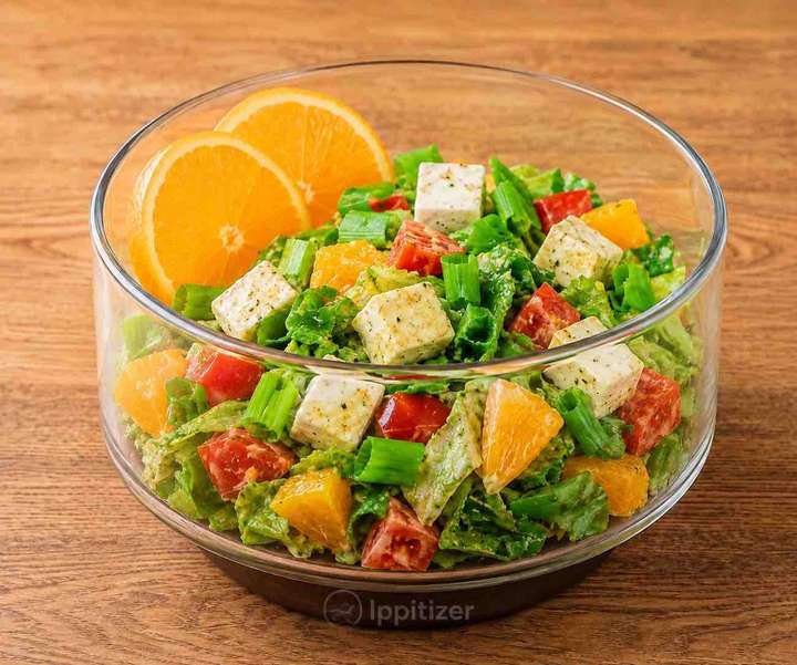 Paneer salad with yogurt and orange dressing 