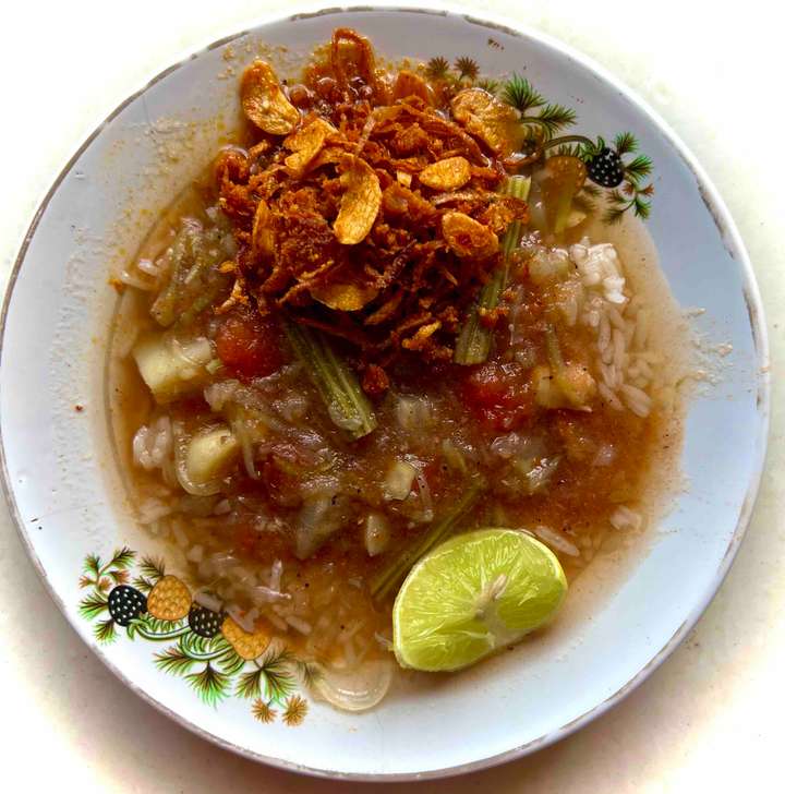 Singaporean veggies noodles soup with roasted shrimp mix