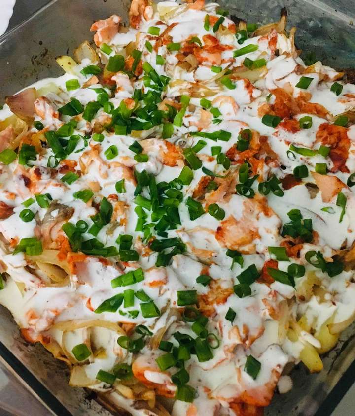Baked salmon with potatoes and onion