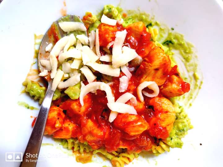 Creamy Avocado pasta with chicken in marinara sauce