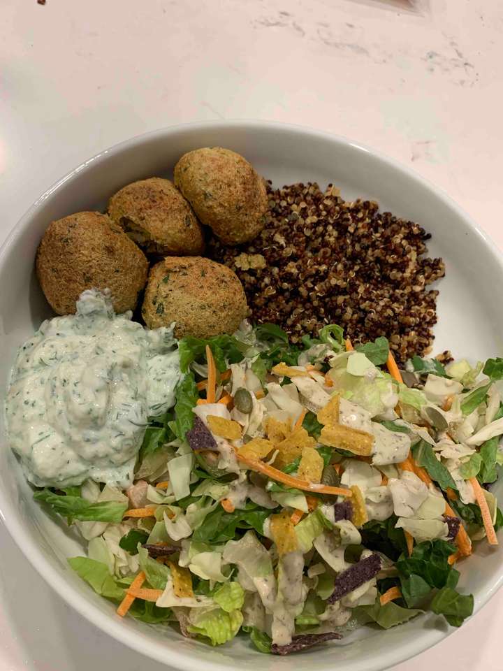 Mediterranean quinoa bowl with falafel, tzatziki