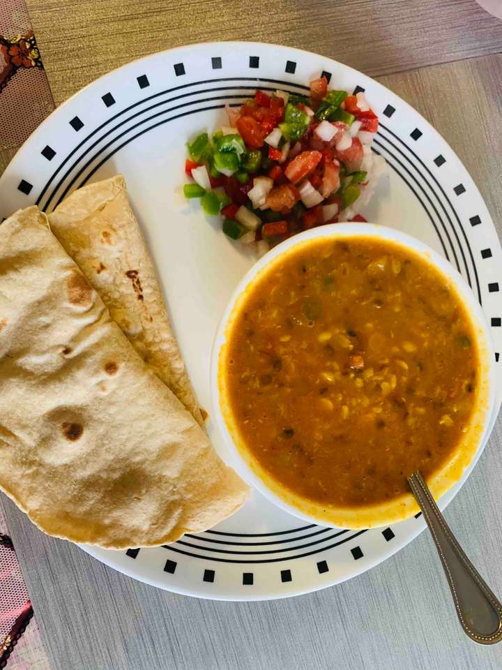 Daal curry with roti and salad