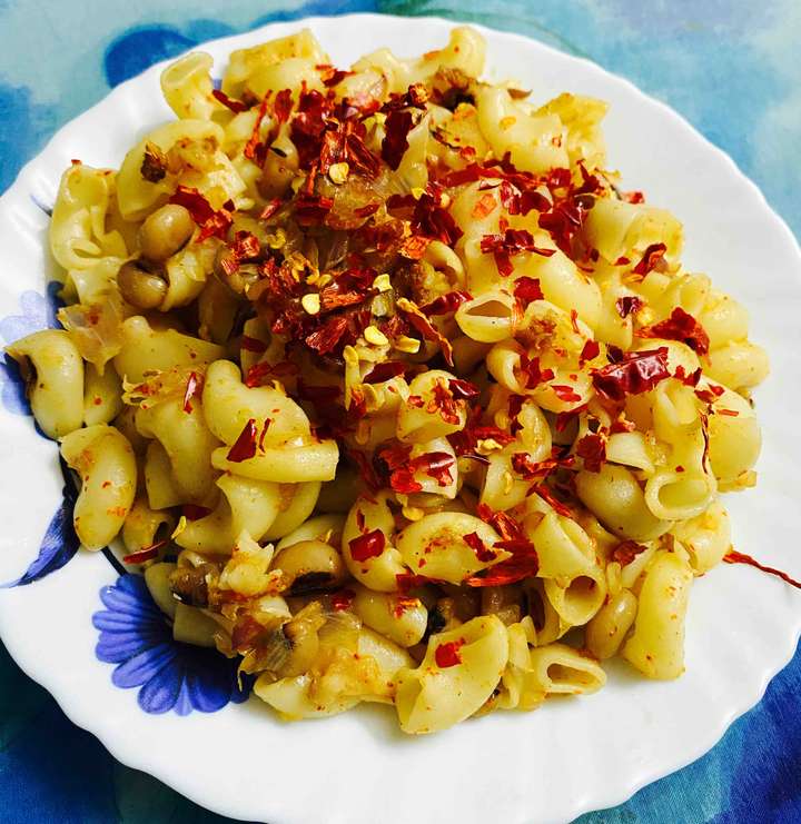 Macroni Cooked in Ginger- Garlic paste