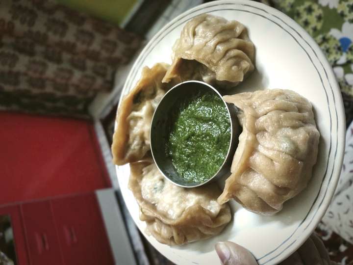 Steamed Chicken atta momo with coriander chutney