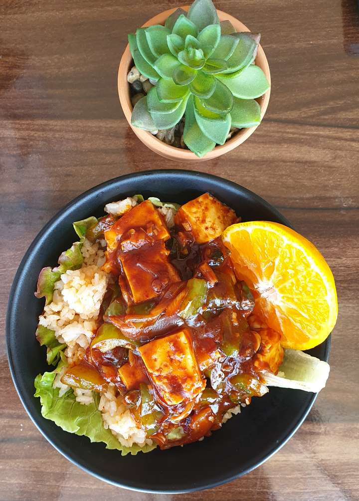 chilly paneer with orange gravy.